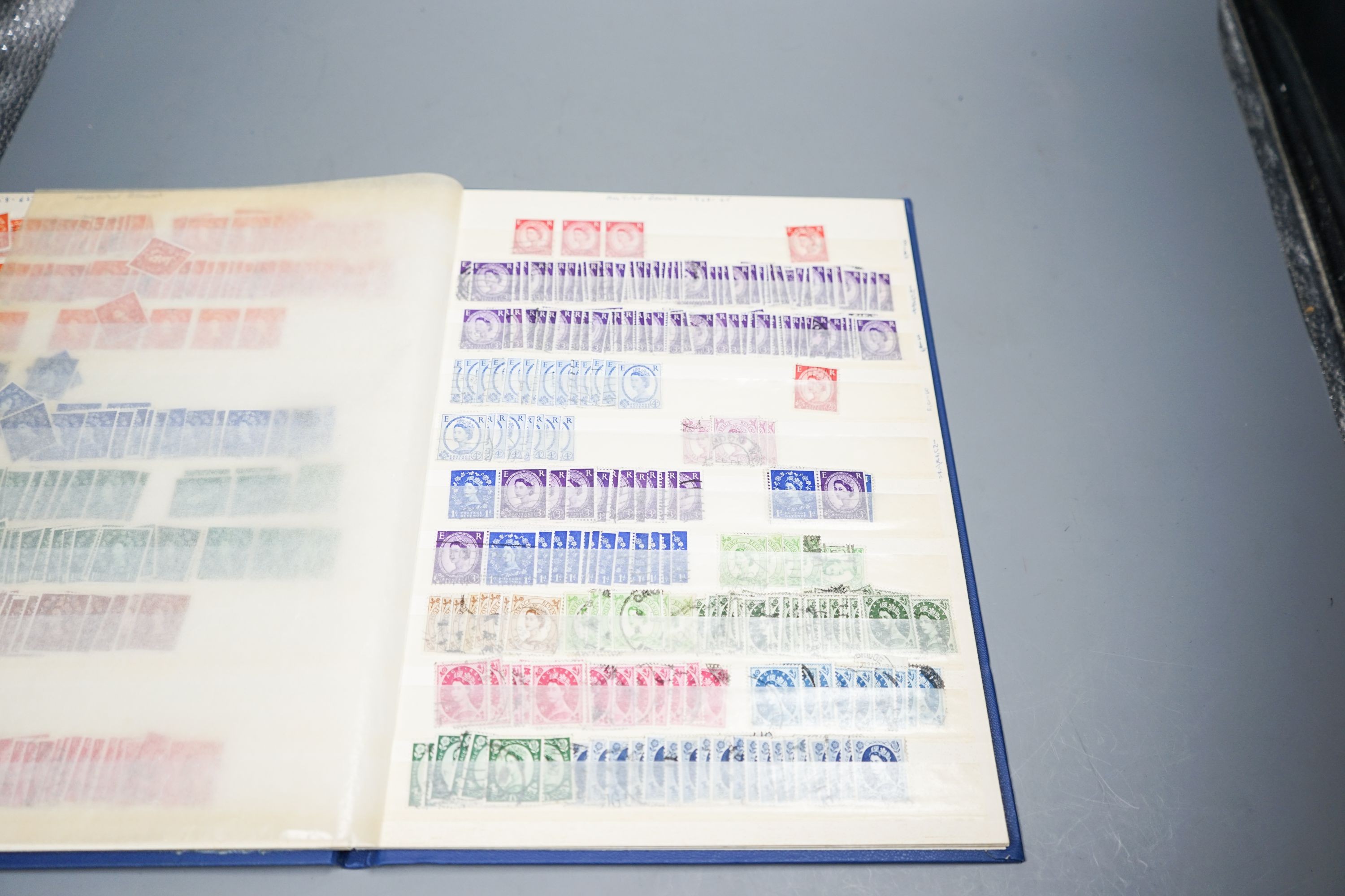 A large accumulation of World stamps in albums, stock books with Great Britain from 1d Reds to Modern Decimal Mint, Australia, Canada and New Zealand and loose (3 plastic tubs)